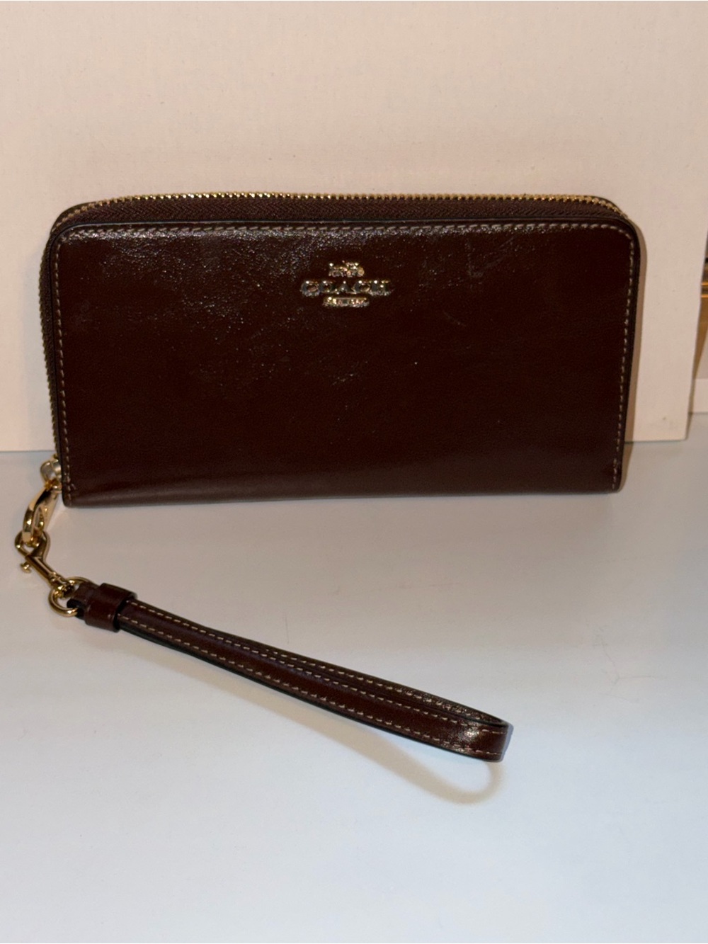 Coach Dark Brown Leather Zip-Around Wristlet with Gold Hardware
